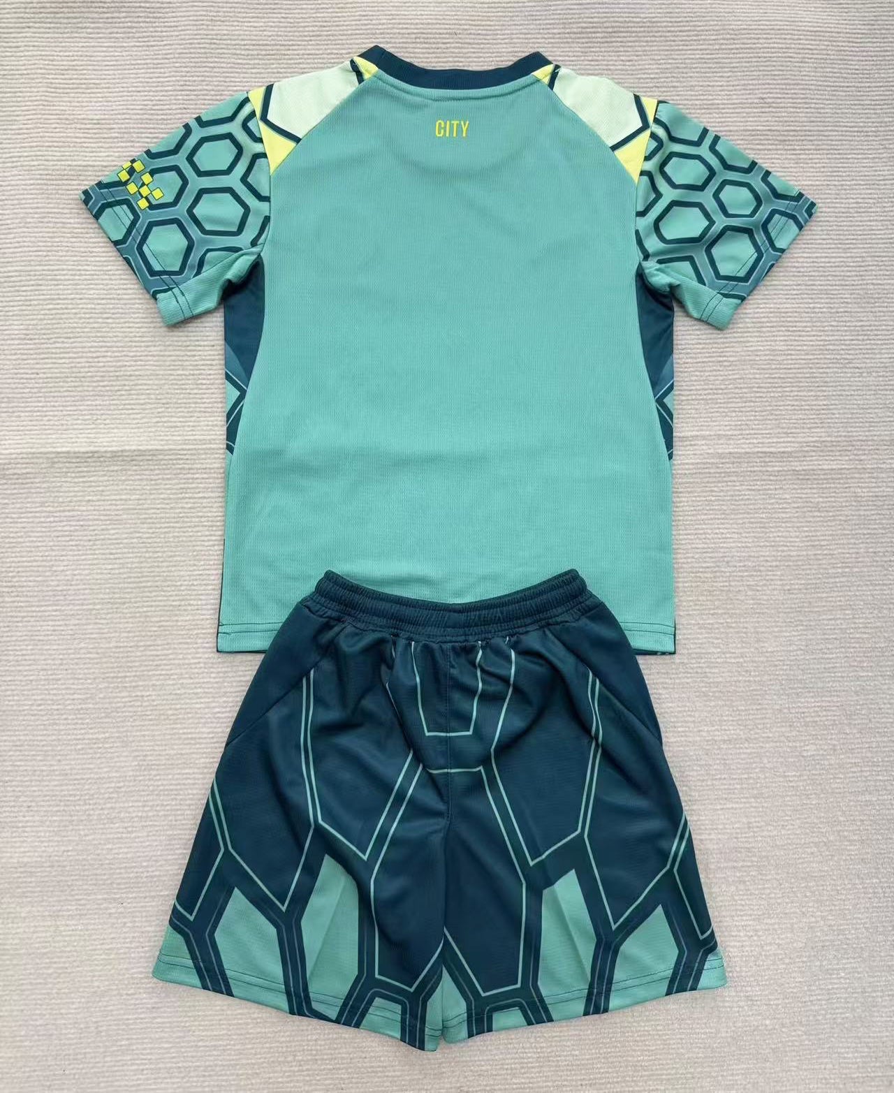 KIT BAMBINO MANCHESTER CITY PORTIERE 2026/27 - GREEN